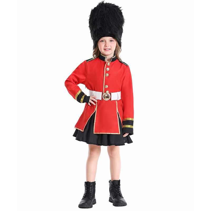 Girl wearing a red royal guard Halloween costume with gold trim, white belt, black skirt and tall black faux fur hat - view 6