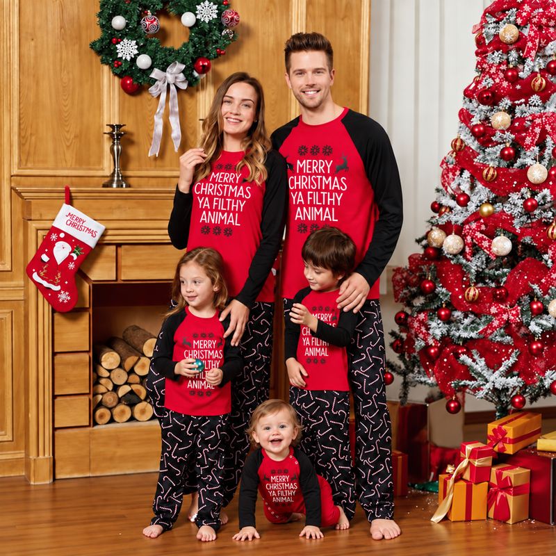 Matching Christmas pajamas for family, red slogan raglan top and black candy cane pajama pants
