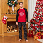 Matching Christmas pajamas for family, red slogan raglan top and black candy cane pajama pants - view 3