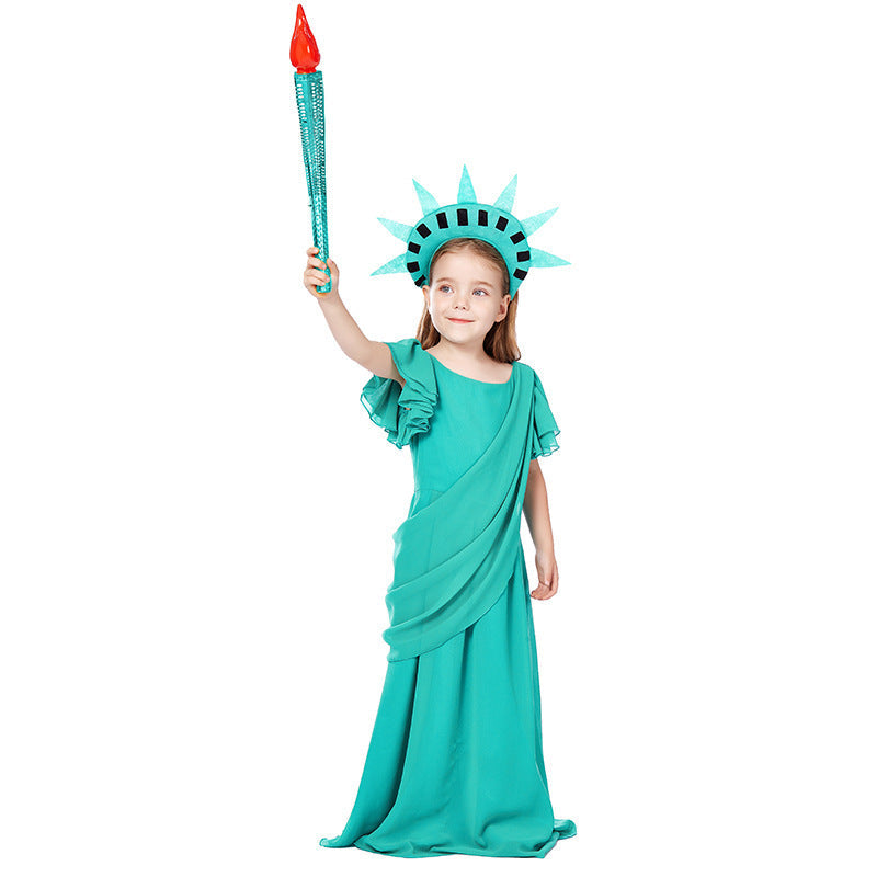Girl wearing a green Statue of Liberty costume maxi dress with flutter sleeves and draped sash