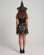 Women's black witch Halloween costume with gold star print skirt, lace-up bodice, mesh puff sleeves, buckle belt and pointed hat - view 3