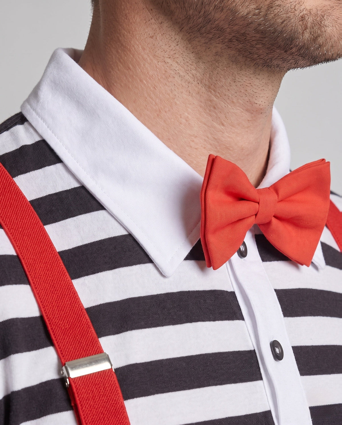 Men's mime Halloween costume with black and white striped top, red pants, red suspenders, bow tie, beret and glasses - view 2