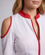 Woman wearing white nurse Halloween costume mini dress with red trim, cold-shoulder sleeves and matching hat - view 3