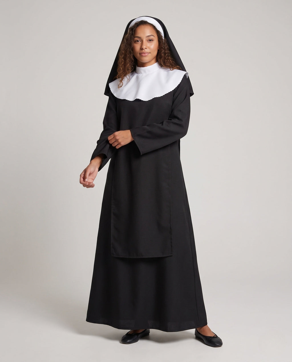 Women's nun Halloween costume with black robe, white scalloped collar and veil