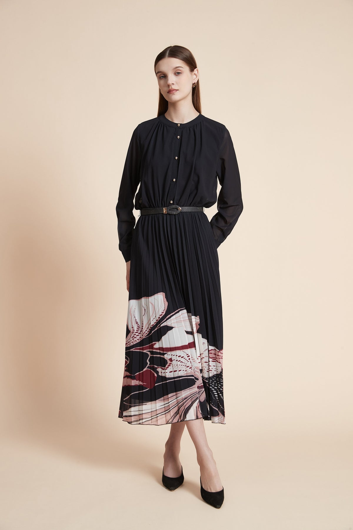 Black long sleeve midi dress with sheer sleeves, gold buttons and pleated skirt with pink and ivory floral hem print - view 3