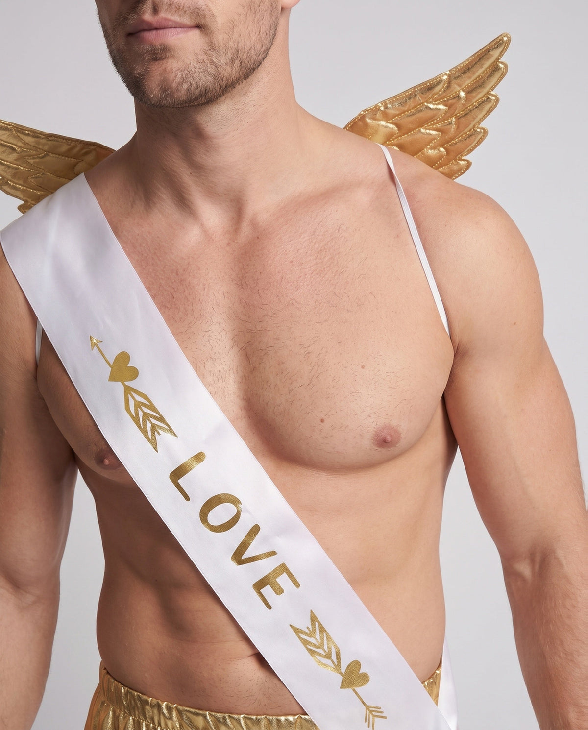 Men's Cupid Halloween costume with white wrap skirt, gold waistband, gold wings, LOVE sash and gold cuffs - view 2