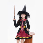 Girl wearing a black and burgundy witch costume with a pointed hat and striped tie - view 7