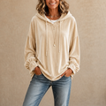 Pink velvet hoodie with ruffle cuffs and drawstring hood, a relaxed women's winter top worn with jeans - view 14