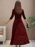 Woman wearing an embossed velvet square neck midi dress with full A-line skirt - view 10