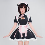 Women's black maid Halloween costume with heart cutout, white ruffled apron and pink bows