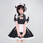 Women's black maid Halloween costume with heart cutout, white ruffled apron and pink bows - view 2