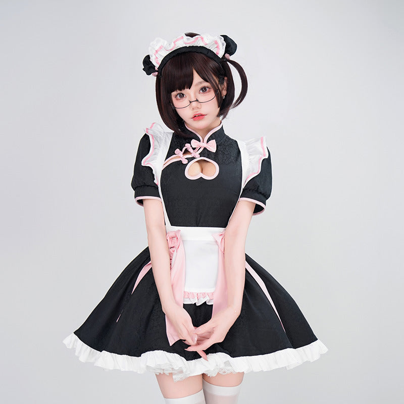 Women's black maid Halloween costume with heart cutout, white ruffled apron and pink bows - view 2