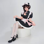 Women's black maid Halloween costume with heart cutout, white ruffled apron and pink bows - view 3