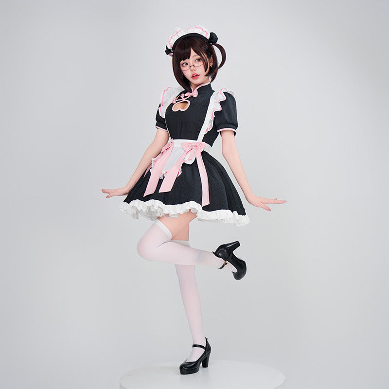 Women's black maid Halloween costume with heart cutout, white ruffled apron and pink bows - view 4