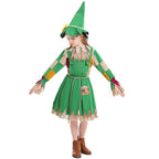 Girl wearing a green scarecrow Halloween costume with patchwork sleeves, fringe trim, rope belt and sunflower hat - view 5