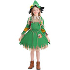 Girl wearing a green scarecrow Halloween costume with patchwork sleeves, fringe trim, rope belt and sunflower hat - view 6