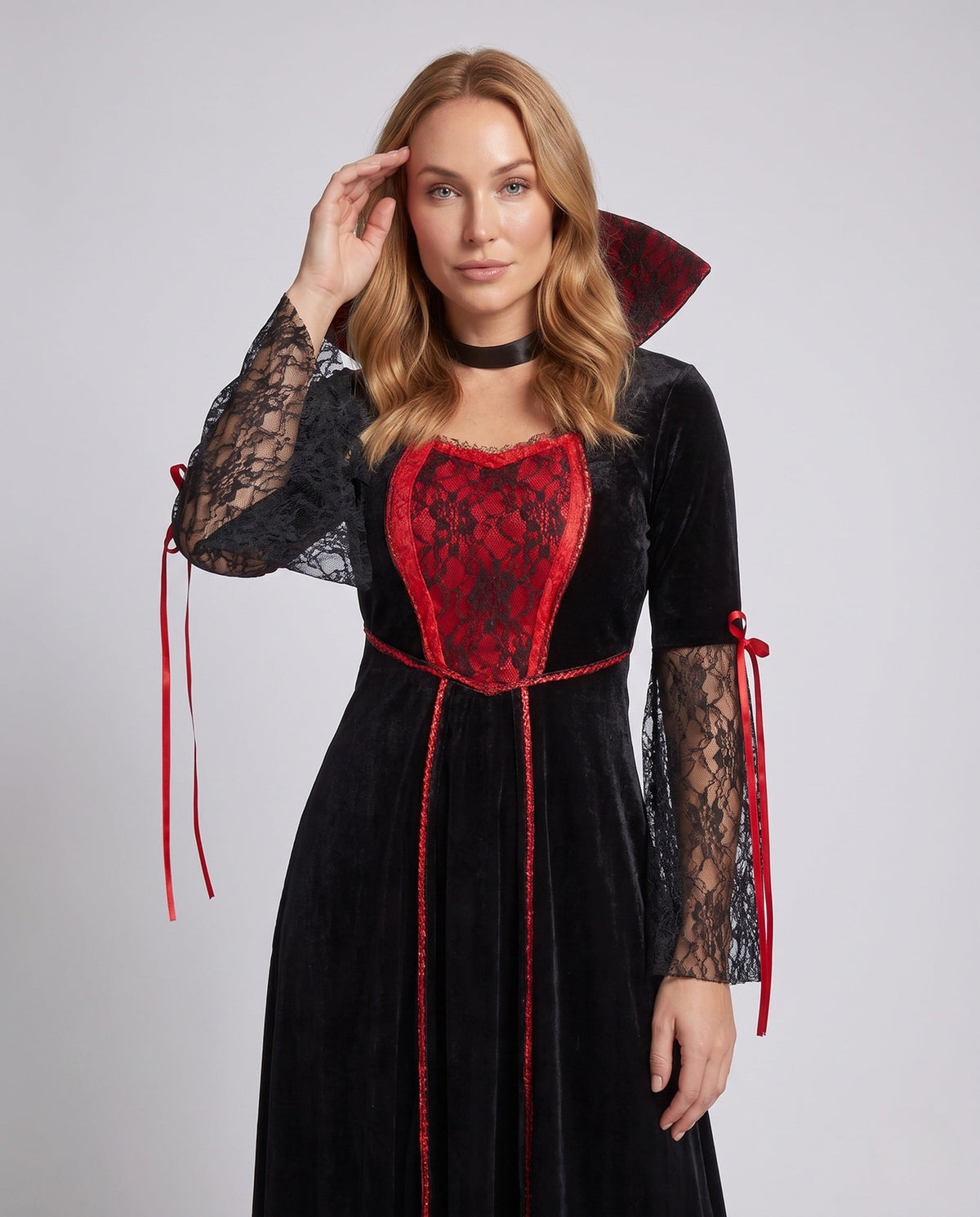 Women's black velvet vampire costume dress with red lace front panel, high collar and lace bell sleeves - view 2