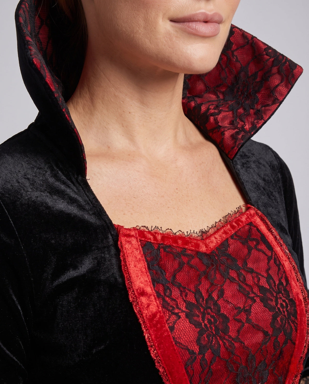 Women's black velvet vampire costume dress with red lace front panel, high collar and lace bell sleeves - view 3