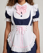 Women's navy maid Halloween costume dress with white lace-trimmed apron, pink bow and ruffled headband - view 2