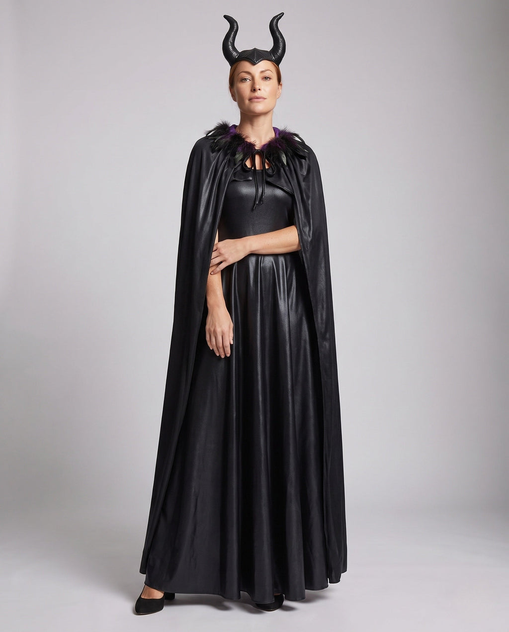 Women's black devil Halloween costume with feather-collar cape and horn headband