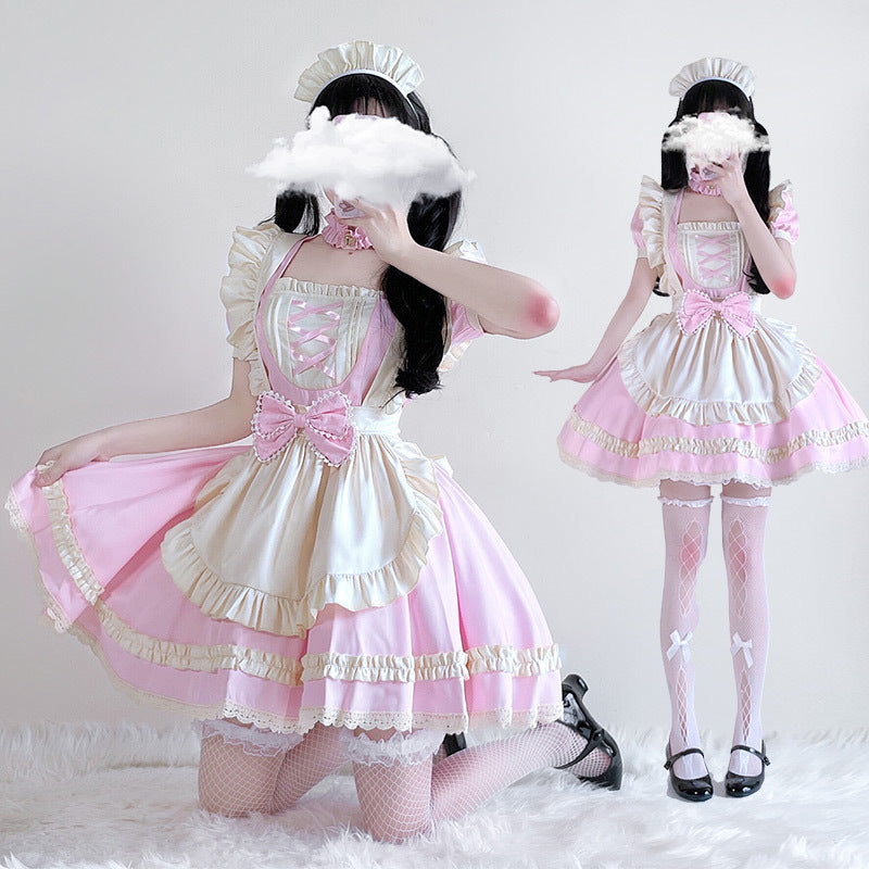 Women's maid Halloween costume with pink dress and cream ruffled apron