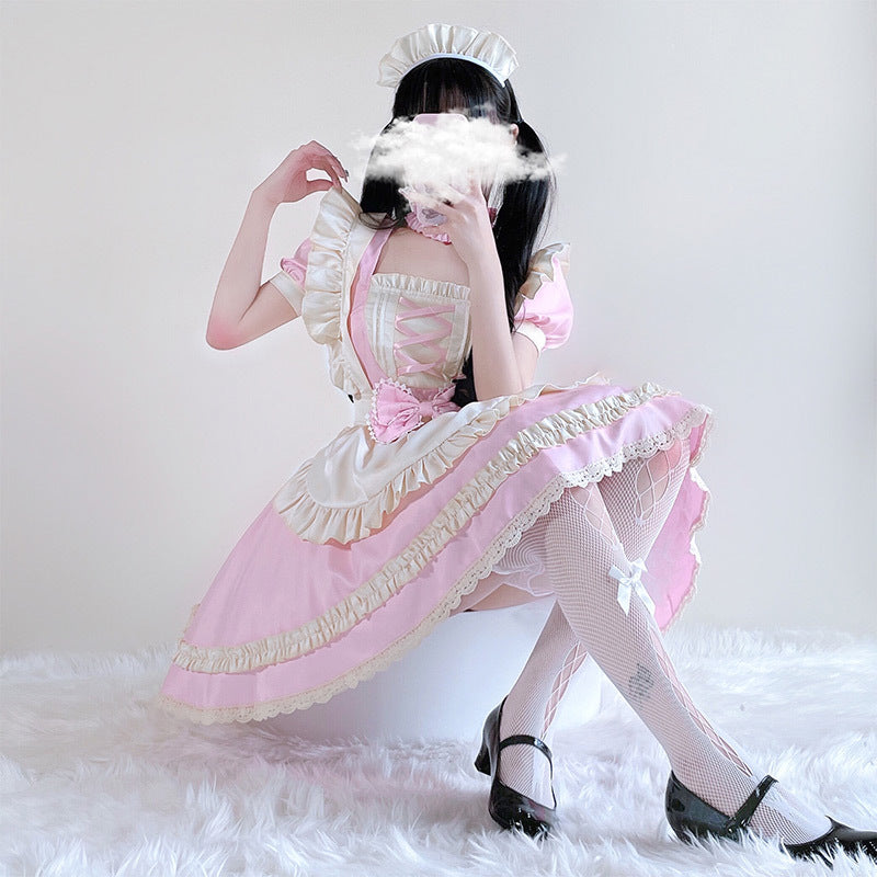 Women's maid Halloween costume with pink dress and cream ruffled apron - view 2