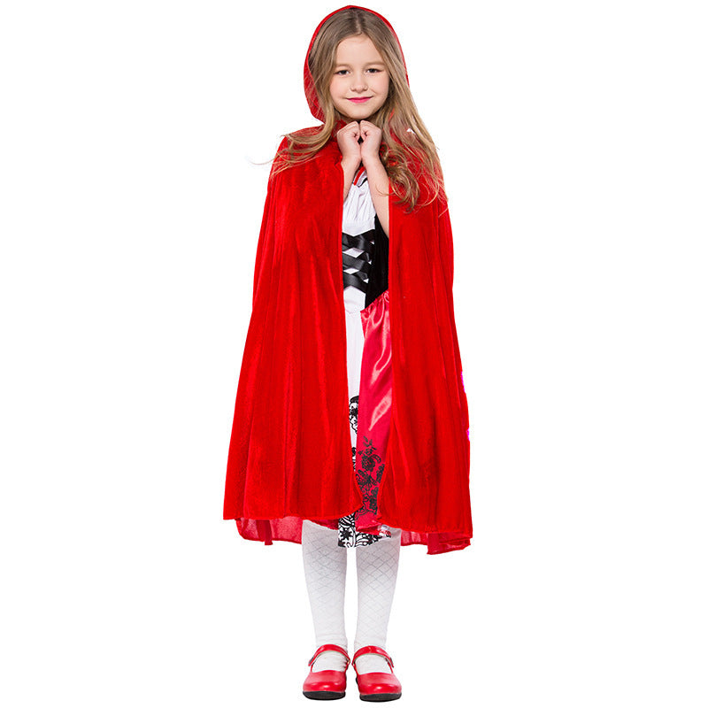 Girl wearing a fairytale costume with red velvet hooded cape and red satin dress with black lace-up bodice - view 2