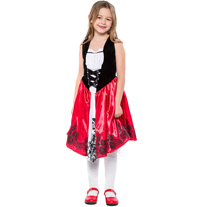 Girl wearing a fairytale costume with red velvet hooded cape and red satin dress with black lace-up bodice - view 3