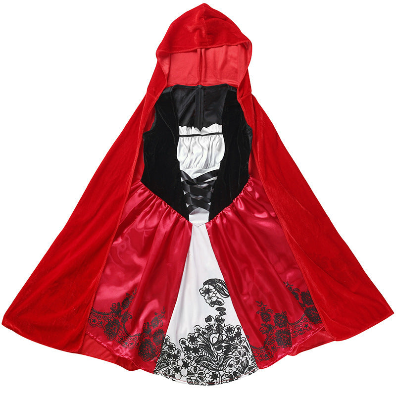 Girl wearing a fairytale costume with red velvet hooded cape and red satin dress with black lace-up bodice - view 5