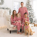 Family in matching red and white striped Christmas pajamas with gray ribbed cuffs - view 15