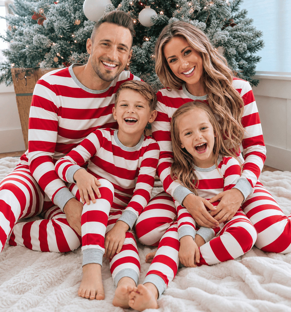 Family in matching red and white striped Christmas pajamas with gray ribbed cuffs - view 2
