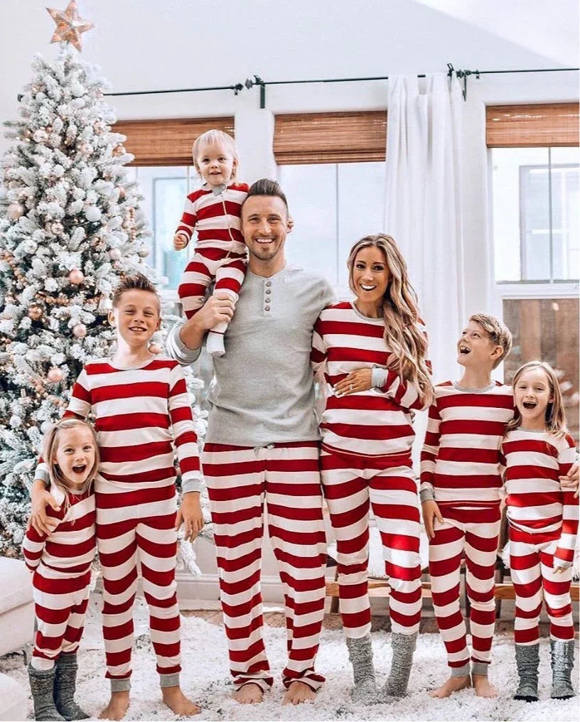 Family in matching red and white striped Christmas pajamas with gray ribbed cuffs - view 5