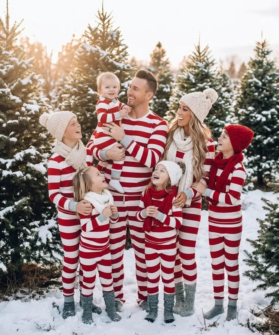 Family in matching red and white striped Christmas pajamas with gray ribbed cuffs - view 6