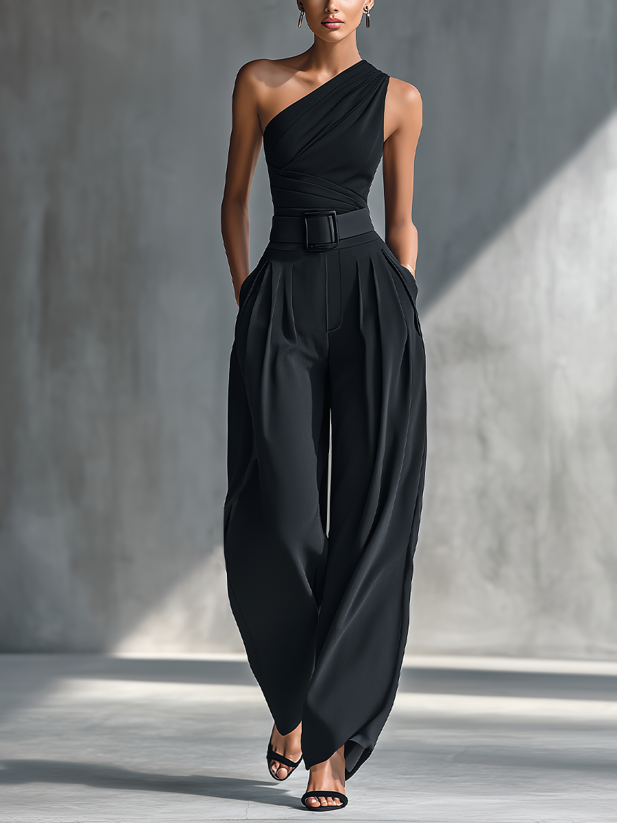 Woman in black one-shoulder top and pleated wide leg pants set