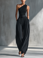 Woman in black one-shoulder top and pleated wide leg pants set