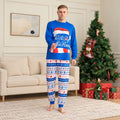 Family wearing blue Christmas pajamas with Santa hat graphic and snowflake print pants - view 3
