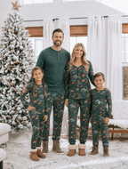 Family wearing matching green safari print Christmas pajamas - view 2