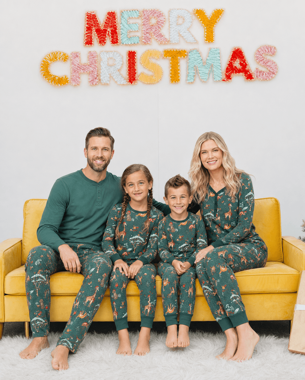 Family wearing matching green safari print Christmas pajamas - view 5