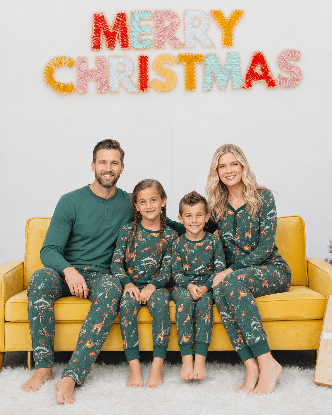 Family wearing matching green safari print Christmas pajamas - view 5