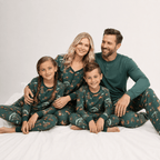Family wearing matching green safari print Christmas pajamas - view 8