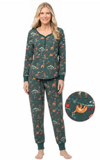 Family wearing matching green safari print Christmas pajamas - view 9