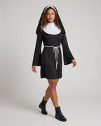 Women's black nun Halloween costume mini dress with white bib collar, bell sleeves and tie belt