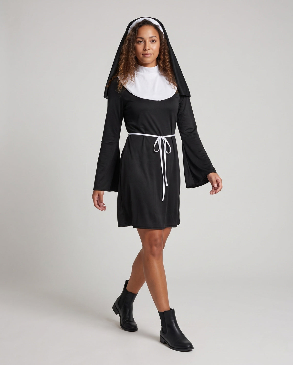 Women's black nun Halloween costume mini dress with white bib collar, bell sleeves and tie belt