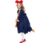 Girl wearing navy witch costume dress with puffed ruffle sleeves and ruffle hem - view 3