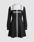 Black long sleeve nun-inspired Halloween costume mini dress with white pleated bib and lace cross trim - view 4
