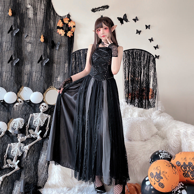 Women's black gothic witch costume dress with laced studded bodice and layered tulle and lace maxi skirt