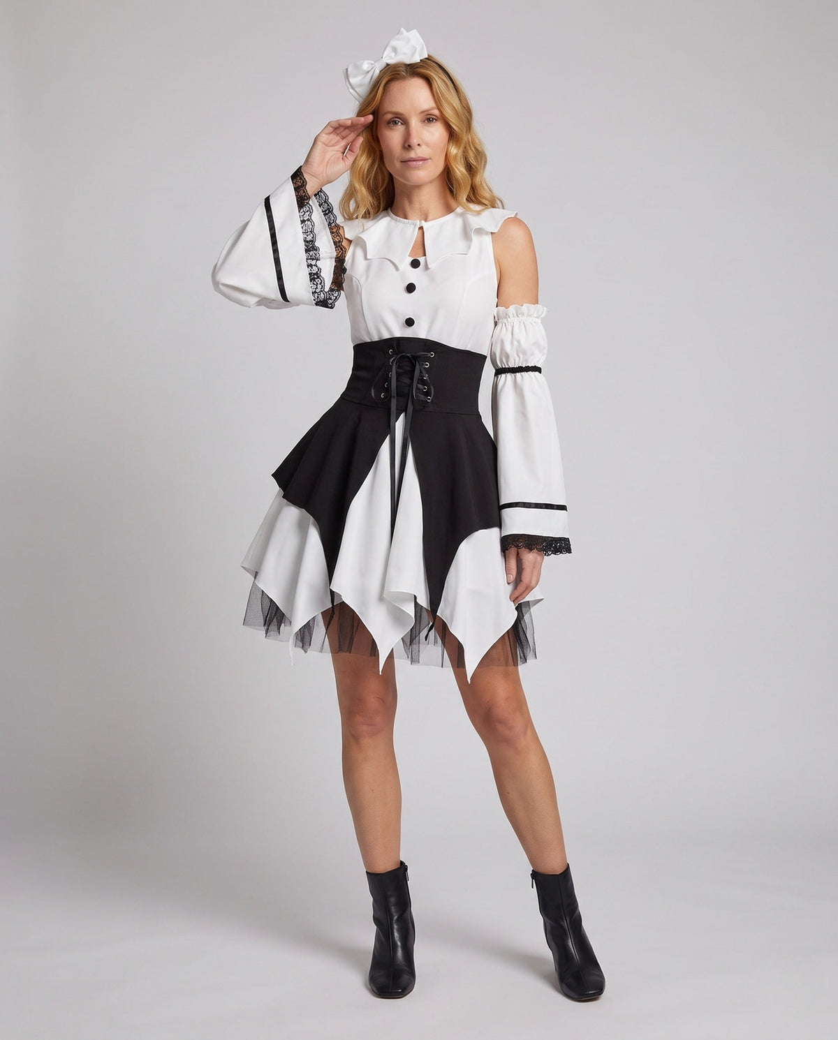 White and black gothic Halloween costume dress with lace-up corset waist, handkerchief hem and lace-trimmed detached bell sleeves