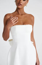 Strapless mini dress with pearl-trim neckline and oversized cascading back bow - view 10