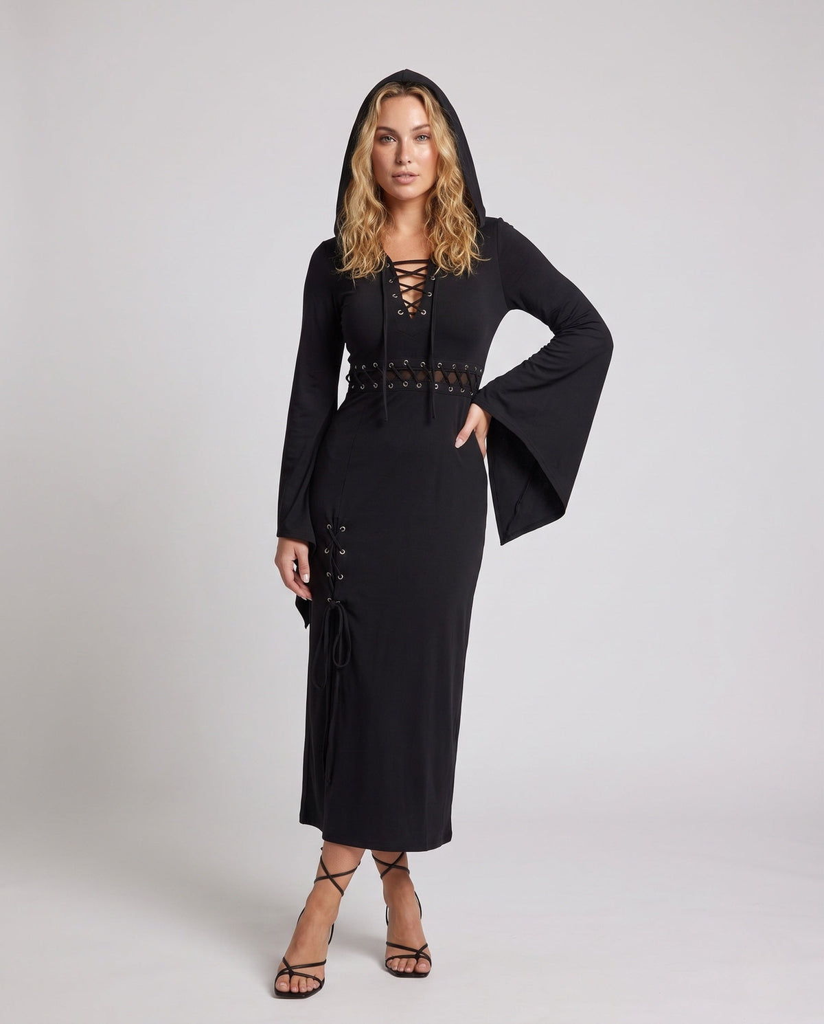 Black hooded midi dress with bell sleeves and lace-up details