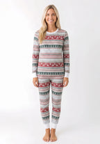 Family wearing matching Fair Isle Christmas pajamas with reindeer and snowflake print and white cuffs - view 8